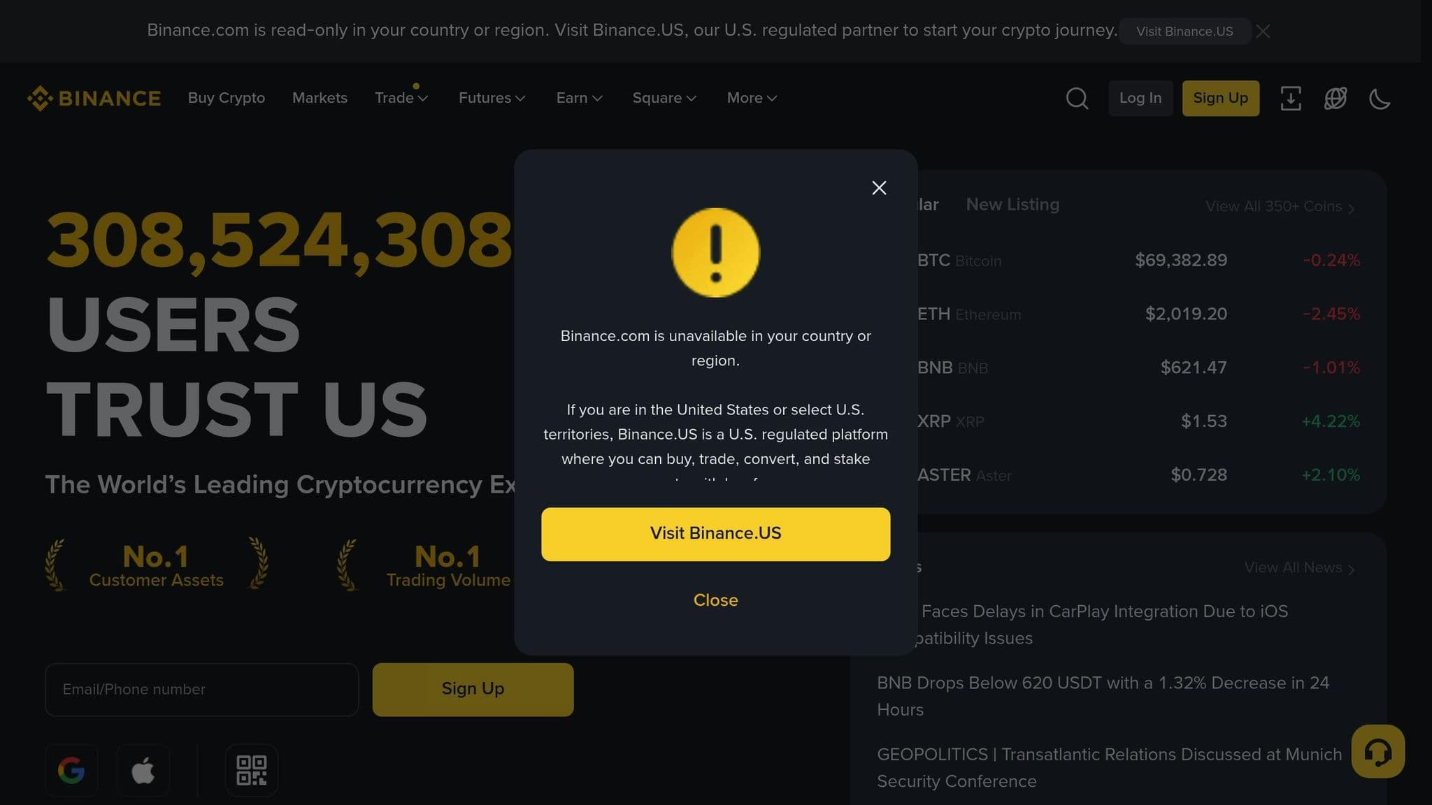 Binance homepage with a location notice recommending Binance US